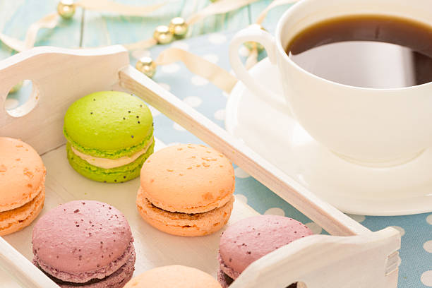 istock macaroons on wooden plate 505916662