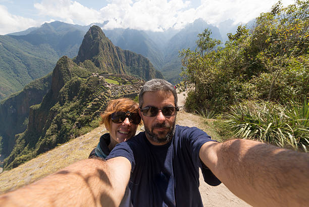 istock Couple taking selfie at Machu Picchu, Peru 505919112