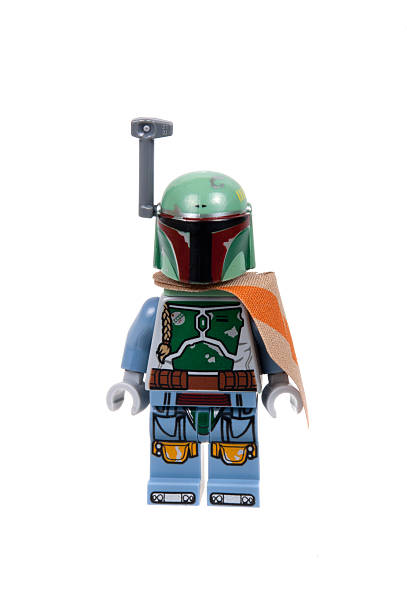 Boba Fett Lego Minifigures Adelaide, Australia - January 21, 2016: A studio shot of a Boba Fett minifigure from the Star Wars Empire Strikes Back Movie. Lego is extremely popular worldwide with children and collectors. This Minifigure appears in the 75137 Carbon Freezing Chamber Lego Kit. bounty hunter stock pictures, royalty-free photos & images