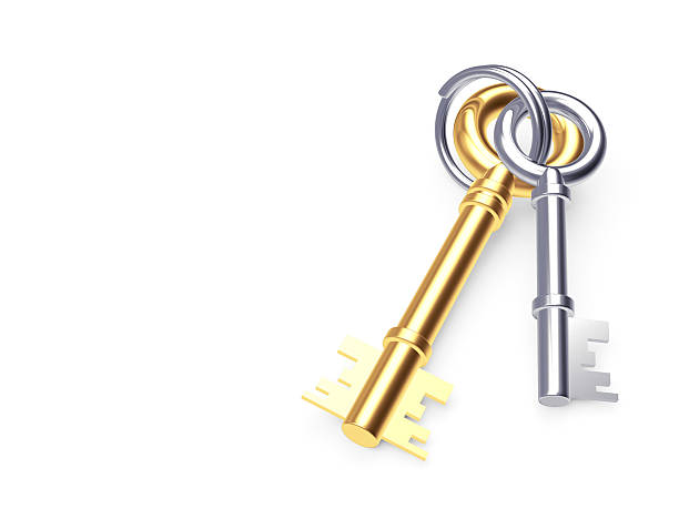 istock Bunch of old golden and silver keys on keyring 505922582