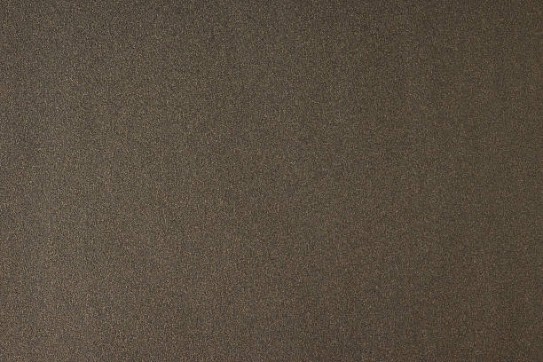 istock Glittering brown paper sheet texture background. Sparkling golden bronze pattern. 505923224