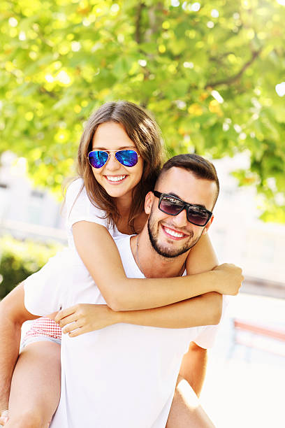 istock Playful couple in the park 505923286