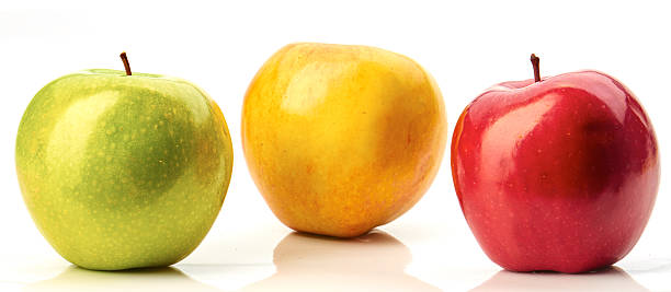 istock Red, green and yellow apples isolated on white 505923608
