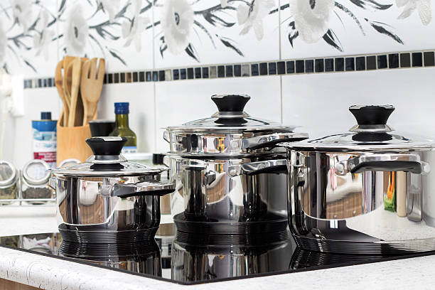 istock Modern induction cooker with the silver pots 505935266