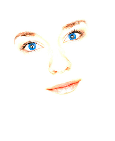 High key image of a young woman wearing blue contact lenses