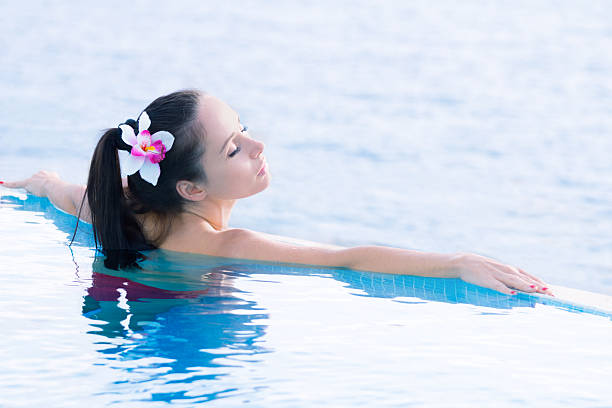 istock beautiful day in the pool 505936442
