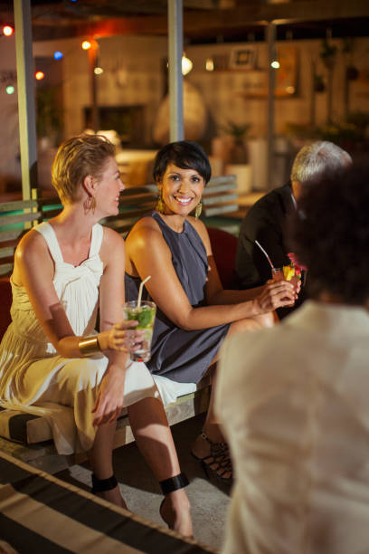 istock Women relaxing at party 505936571