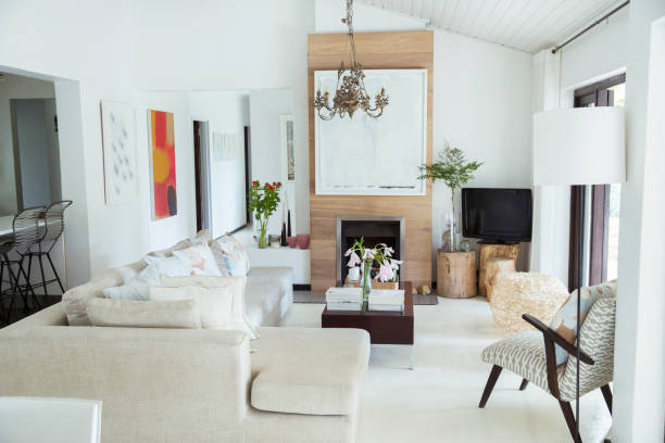istock Sofa, coffee table and fireplace in modern living room 505937401