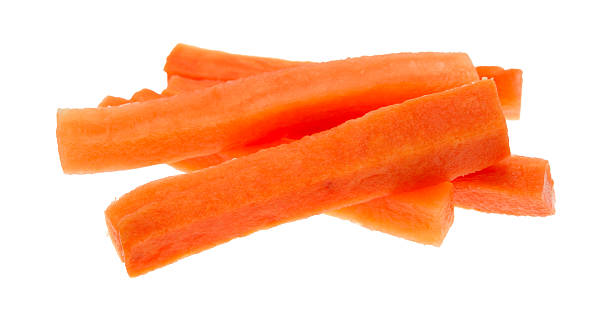 морковные соломки на белом фоне - carrot vegetable portion cross section стоковые фото и изображения