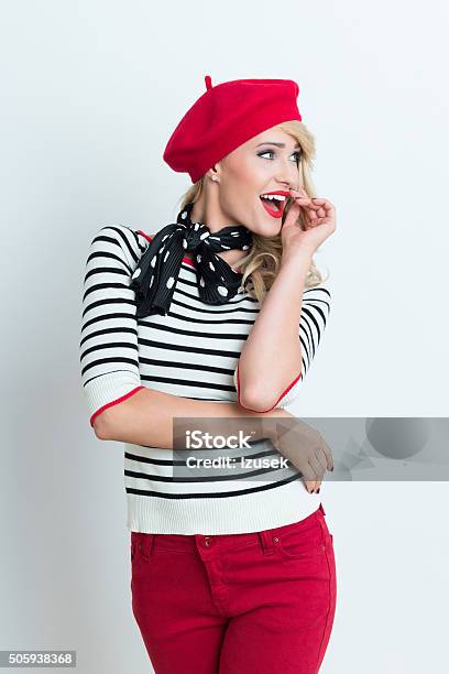 Excited Blonde French Woman Wearing Red Beret Stock Photo - Download Image Now - Adult, Adults Only, Arts Culture and Entertainment