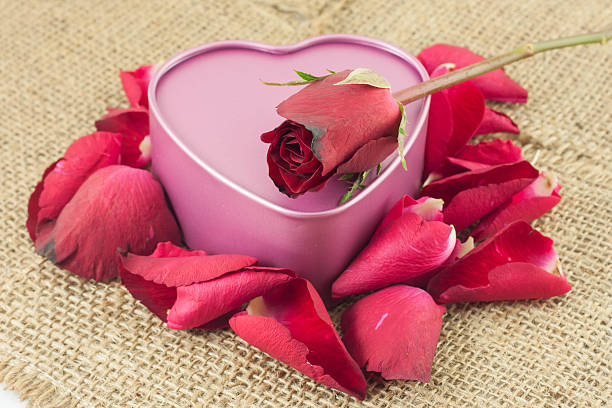 istock Heart shaped metal box is placed on sackcloth. 505938504
