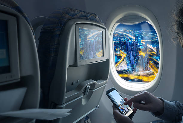 istock Night cityscape from an airplane 505940432