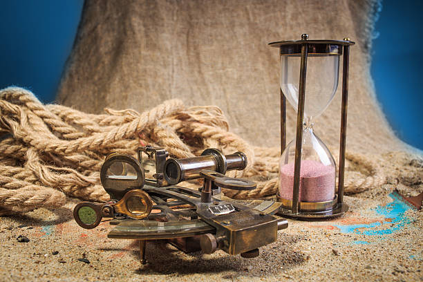 istock set of nautical instruments, lying on the sand and old 505940770
