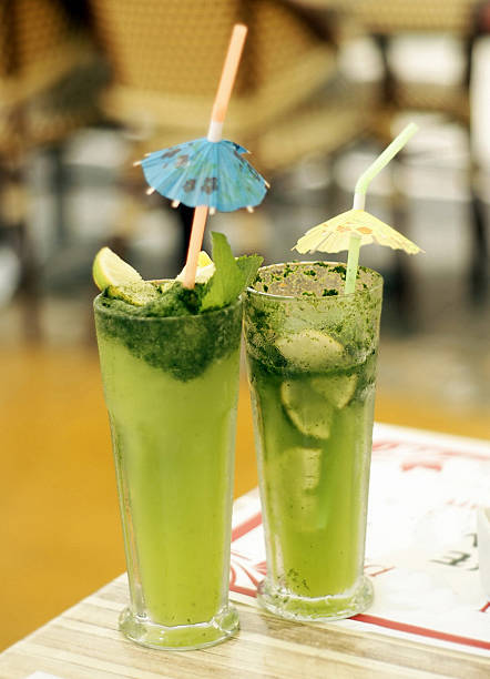 istock Two cocktails with straws on the table 505942366