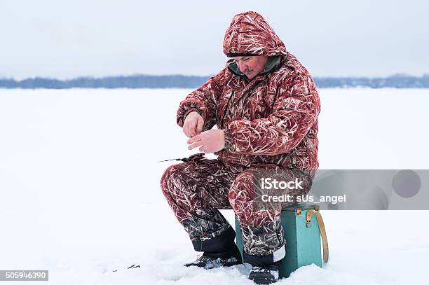 Fisher Preparing For Fishing Stock Photo - Download Image Now - Adult, Adults Only, Fish