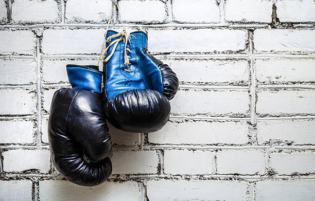 istock Boxing gloves on brick wall 505948216