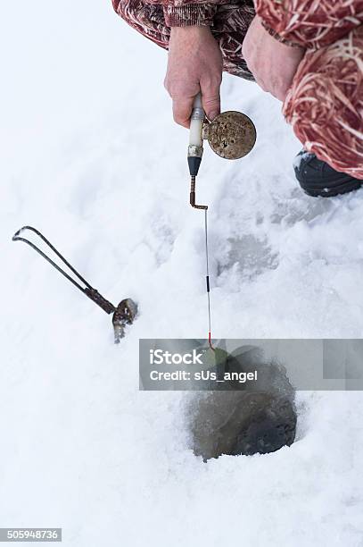 Man Fishing Stock Photo - Download Image Now - Ice Fishing, Adult, Adults Only