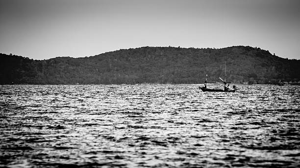 Fishing boats in the sea Fishing boats in the sea dogger stock pictures, royalty-free photos & images