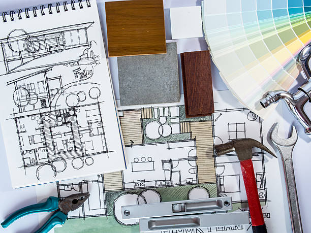 istock Concept of  home renovation with architecture drawing and work tools 505951909