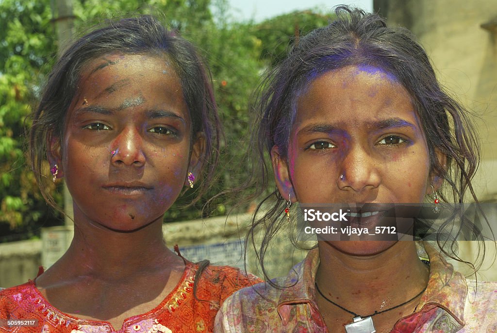 Friends Little girls having fun on the occassion of HOLI festival celebrated in India. Adult Stock Photo