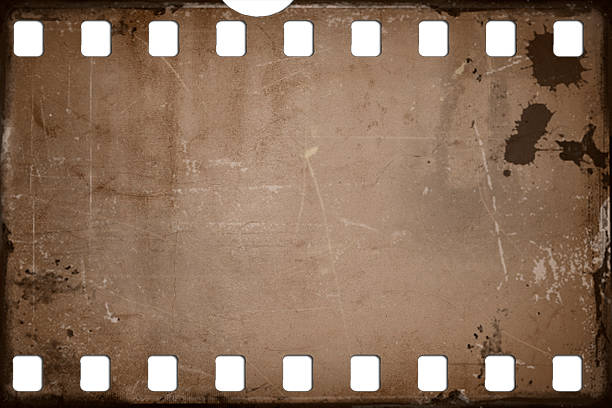 istock grunge scratched film strip background 505954097