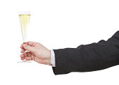 side view of champagne glass in male hand