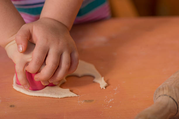 istock Little girl having fun cooking 505960146