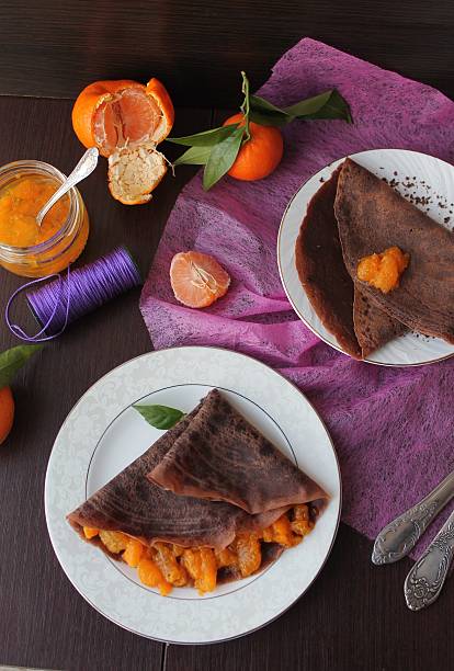 istock Chocolate pancakes with mandarin jam 505961154