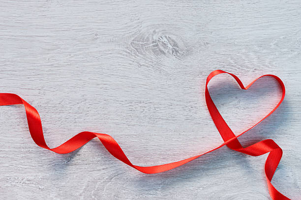 istock Red valentines heart shaped ribbon 505961926