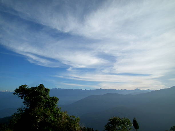 Cloudy twilight The Kanchenjunga (in the Himalayas) is the third highest mountain in the world with an elevation of 8,586 m (28,169 ft) and lies partly in Nepal and partly in Sikkim, India. tiger hill stock pictures, royalty-free photos & images