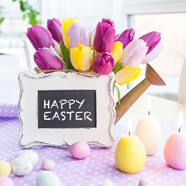 istock Fresh tulips on purple 505963826