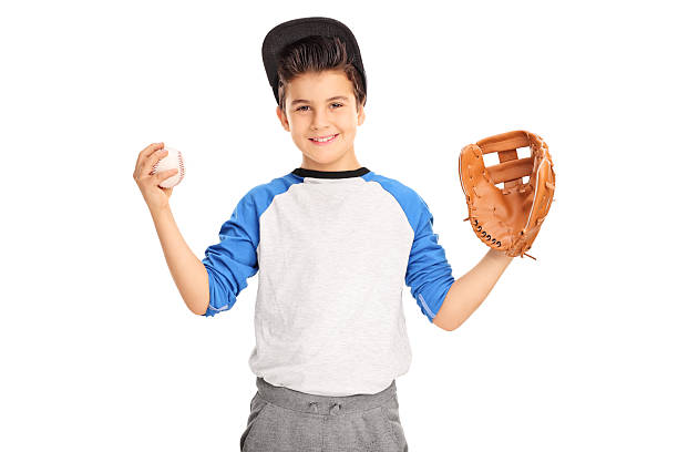 istock Little kid holding a baseball 505964042