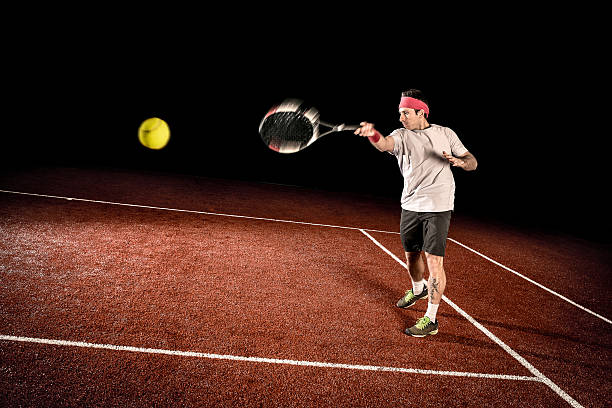 tennisspieler-action: vorhand - indoor tennis flash stock-fotos und bilder