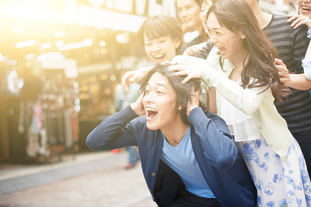 istock Young people  hanging out against cityscape 505965464