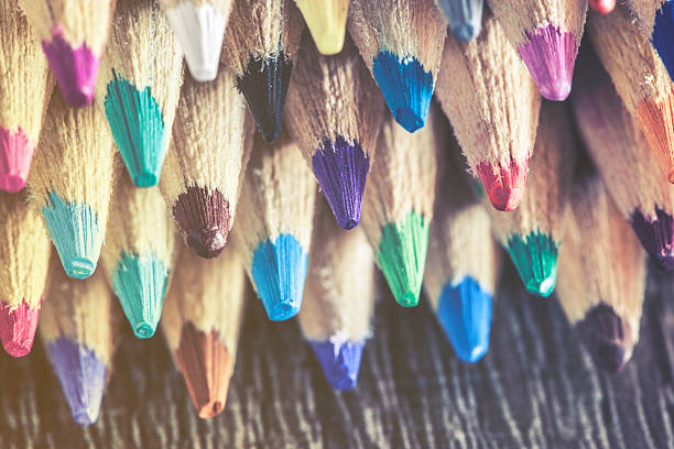 istock Color pencils on wooden desk 505966272