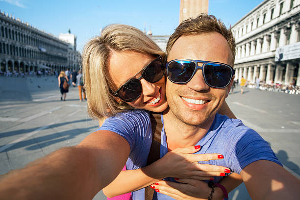 istock Smiling couple making selfie photo 505968352