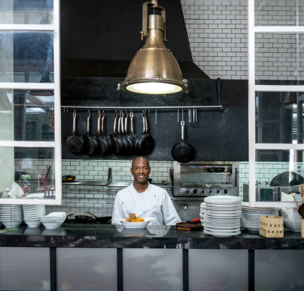 istock African American man working in a kitchen 505969056