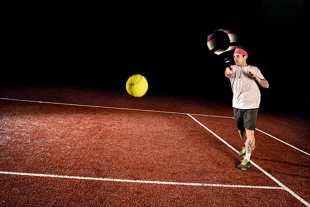 tennisspieler-action: vorhand - indoor tennis flash stock-fotos und bilder