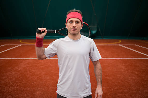 tennis-spieler-porträt - indoor tennis flash stock-fotos und bilder