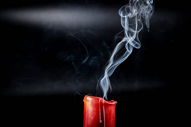 istock gray smoke flying upside from the extinct candles 505972650