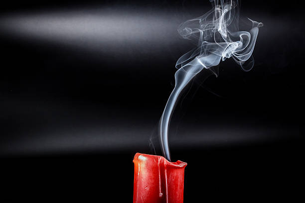 istock smoke flying upside from the extinct red candles 505972720