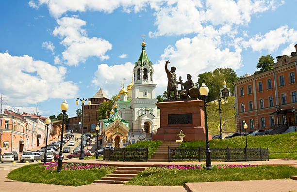 Nizhniy Novgorod, Russia Nizhniy Novgorod, Russia - June 02, 2013: Orthodox church of Nativity of John the Baptist and monument to Minin and Pozharskiy, copy of monument erected in Red square in Moscow in 1818 by sculptor I. P. Martos, erected in 2005 by Z. Tsereteli. nizhny novgorod stock pictures, royalty-free photos & images