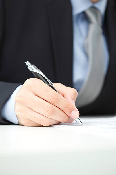 istock Businessman fill the form 505976927