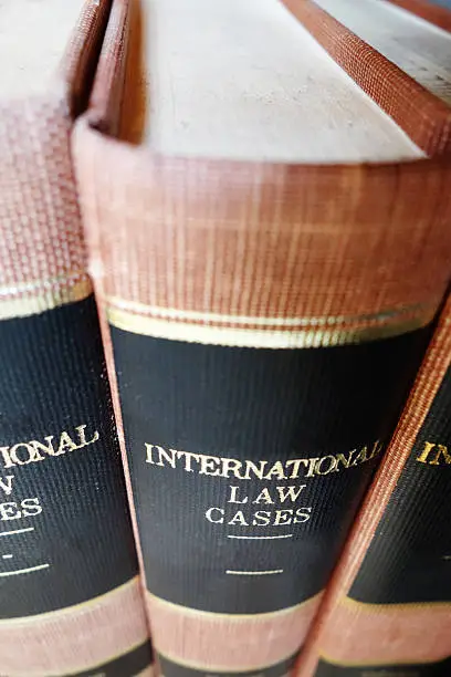 Closeup of law books on a shelf, from above