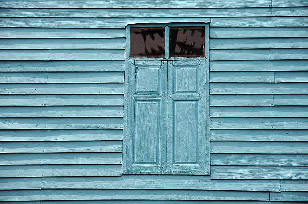 istock Vintage Blue Wooden Wall And Window 505978817