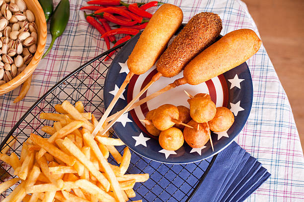corndog with french fries stock photo