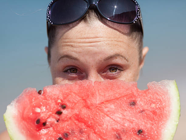 istock Girl with watermelon 505980099