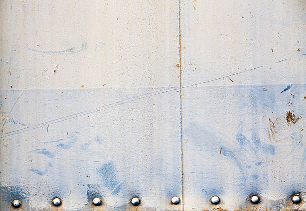 istock background of peeling paint and rusty old metal 505980153