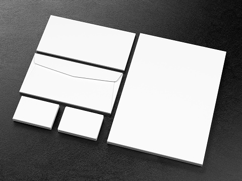 Blank corporate identity template on black leather background