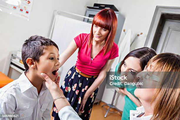 Pediatrician Checking Up Little Boy Stock Photo - Download Image Now - Adult, Assistant, Beautiful Woman